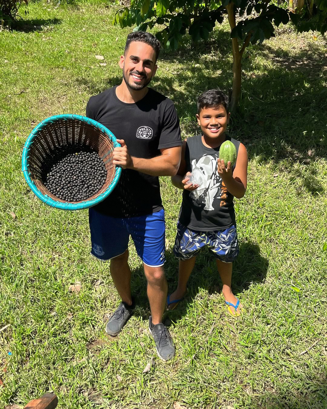 Ayman and Douglas with açaí harvest